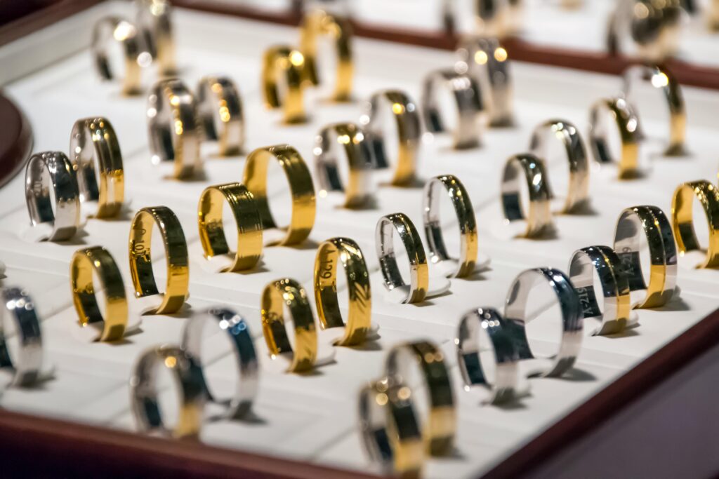 pexels-photo-94843-94843 A luxurious display of gold and silver rings, perfect for showcasing jewelry collections.